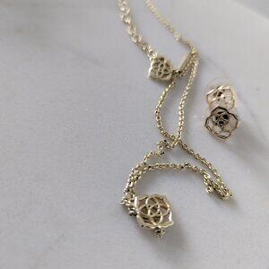 Kendra Scott logo earrings and necklace in gold